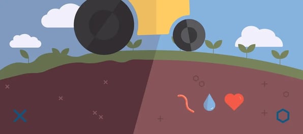 tractor driving over field